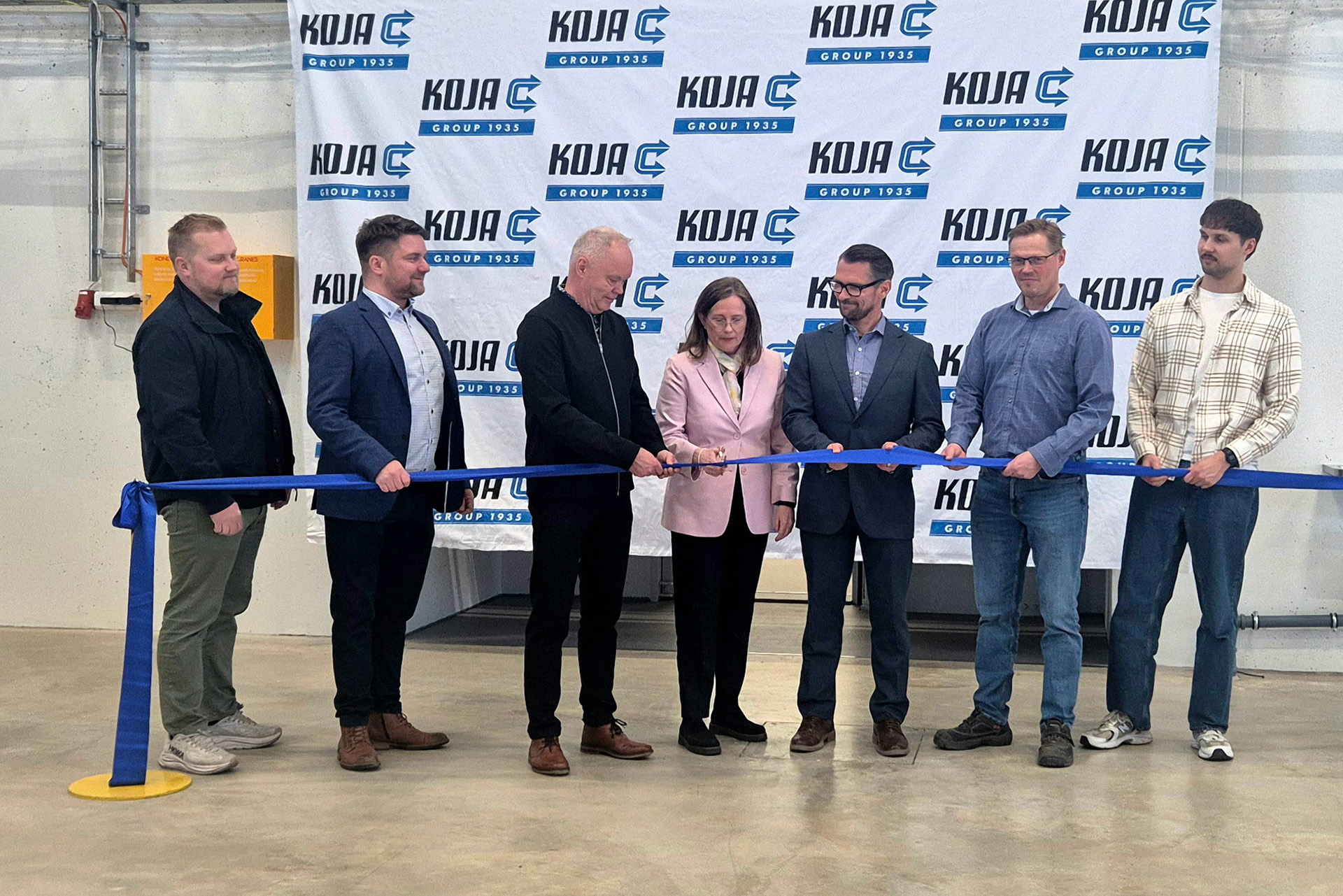 The ribbon-cutting ceremony at the opening of Koja’s Technology and Logistics Center